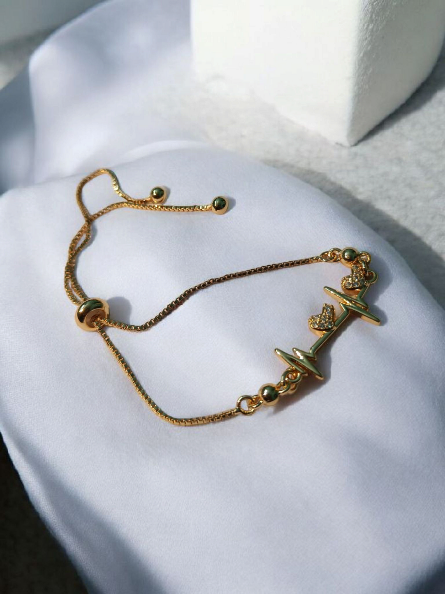 Heartbeat Charm Gold-Plated Adjustable Bracelet for Women and Girls for Casual, Party, and Gifting Use